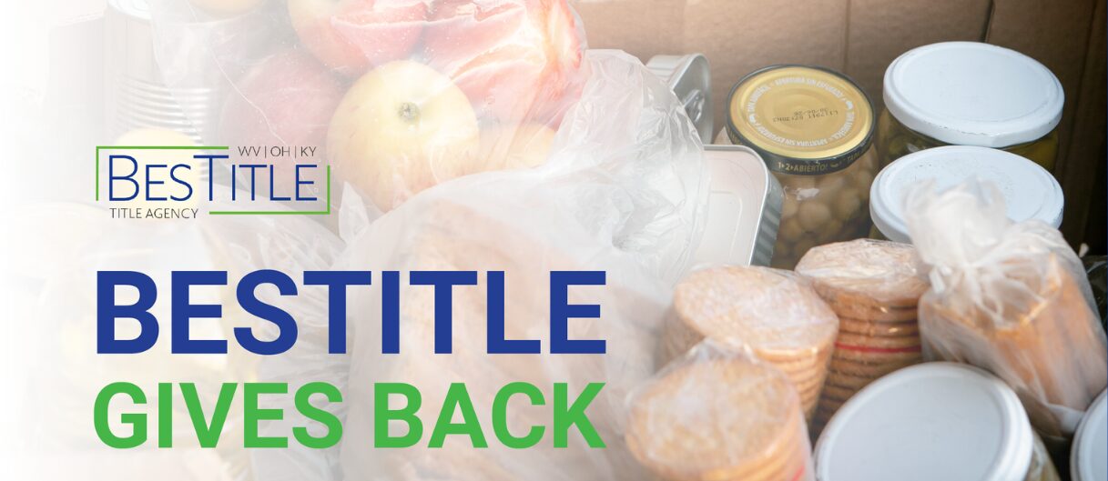 A box of food items being donated. The words "BesTitle Gives Back" appear to the left of the image.